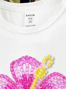 少女印花休闲T恤，适合夏季度假，款式包括白色花朵衬衫、芙蓉花衬衫和热带花朵衬衫。 - 彩色 - 查看 3