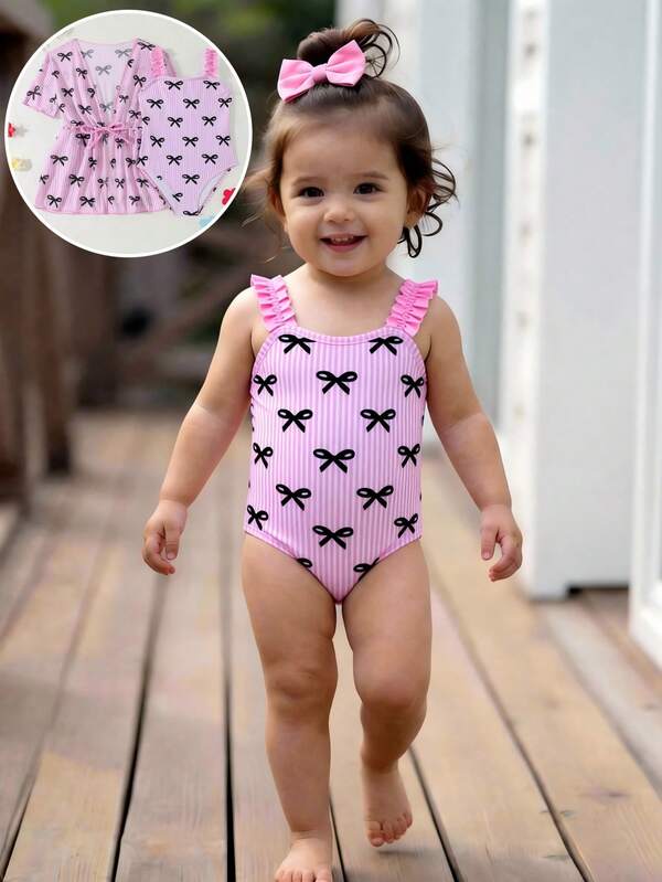 SHEIN Baby Girls Beachwear: This Adorable Multi-Color Bow Patterned Knitted Fabric One-Piece Swimsuit With Shoulder Straps In Plain Color And Net Fabric Top Set Includes Both The One-Piece Swimsuit And The Net Top. It Is Fashionable, Casual, Exquisite And Elegant For Ladies. Suitable For Swimming, Summer Vacations, Summer Beach, Seaside Pool, Swimming Pool, Summer Holidays, Party And Leisure Vacations.