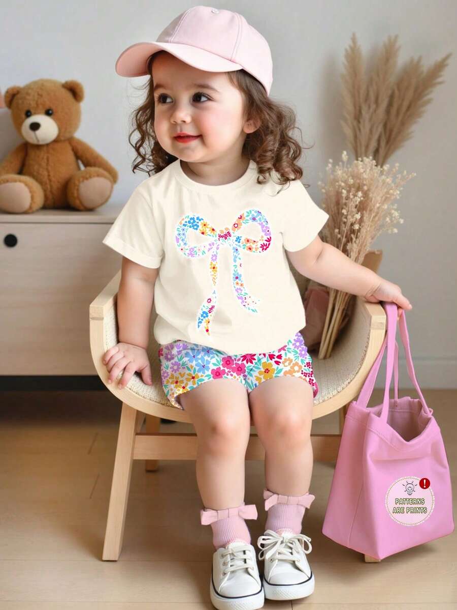 女婴休闲可爱甜美芭蕾舞蝴蝶结装饰,碎花图案,奶油杏色,圆领短袖T恤和打底裤套装,适合春夏日常穿着,姐妹装,度假,Y2K风格,粉色,儿童舒适,儿童日常时尚,儿童套装,夏季服装,花卉时尚,秋季新款,返校时尚,平价时尚,周末穿搭,甜美风格 - 彩色 - 查看 1