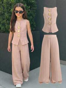 SHEIN Conjunto de chaleco sin mangas de unicolor y pantalones rectos para niña preadolescente, con decoración de metal, estrella de mar y concha, para uso casual, viajes y transporte, color albaricoque - Albaricoque - Ver 3