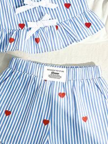 SHEIN Bộ đồ bé gái kiểu dáng giản dị, in hình dâu tây, thắt nơ, viền bèo nhún, gồm áo không tay và quần short, thoải mái và tối giản. - Nhiều màu - Xem 4