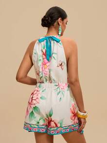 Travachic Bộ jumpsuit cỡ lớn cổ yếm xẻ tà, họa tiết nhiệt đới, hở vai, dáng rộng thanh lịch, thích hợp mặc hàng ngày và đi nghỉ mát, mùa xuân/hè, họa tiết đối xứng. - Nhiều màu - Xem 3