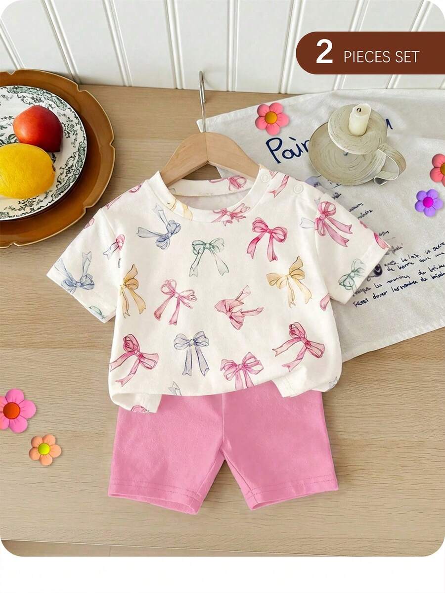 Conjunto de camiseta de manga corta con patrón de lazo y pantalones cortos de cintura elástica, estilo casual de verano para bebé niña recién nacida - Rosa - Ver 1