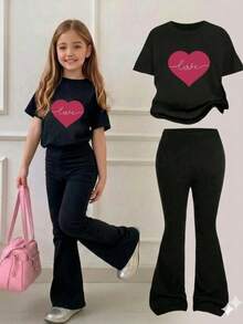 Conjunto playera y pantalón con estampados - Negro - Ver 1