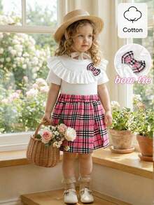 SHEIN Elladie kids 两件套女童休闲新款T恤套装，正面可爱粉色格子图案3D蝴蝶结设计，白色罗纹针织荷叶边T恤，搭配粉色格子开衩短裙，适合可爱、俏皮、休闲、舒适的日常穿着，也适合上学、郊游、海滩、派对等场合。春夏两件套儿童套装，格子裙，女童夏季格子裙，幼儿女童可爱复古风蝴蝶结套装，女童服装裙装套装 - 彩色 - 查看 13