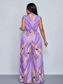 SOLERSUN Bộ jumpsuit không tay in họa tiết hoa lá, eo chun, cổ chữ V dành cho nữ cỡ lớn, thích hợp cho kỳ nghỉ xuân hè và mặc hàng ngày. - Màu tím - Xem 6