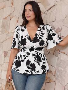 Juhart Áo sơ mi ngắn tay cỡ lớn dành cho nữ, thiết kế xếp ly eo thời trang, họa tiết hoa phổ biến, tay phồng với bo chun ở cổ tay, phù hợp cho kỳ nghỉ biển, đi làm văn phòng và những buổi đi chơi thường ngày. - Nhiều màu - Xem 1