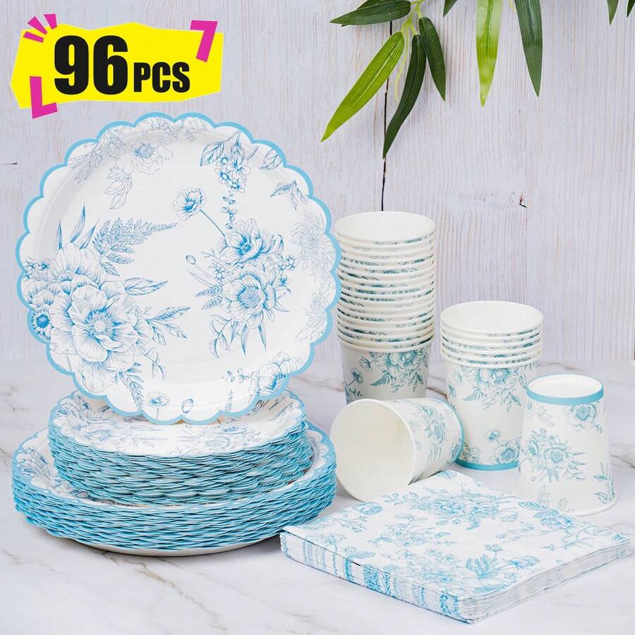白色背景蓝白瓷质一次性餐盘、餐巾纸和纸杯派对套装,可供24位客人使用。这款一次性纸质餐具套装适用于生日派对、婚礼、主题派对和家庭野餐。 - 查看 1
