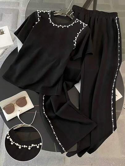 Resyla Bộ đồ 2 món dành cho nữ cỡ lớn: Áo thun ngắn tay cổ tròn đính cườm thủ công và quần dài.