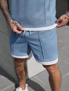 Manfinity CasualCool 男士舒适华夫格针织圆领短袖T恤和抽绳松紧腰短裤两件套，袖口、下摆和裤脚均采用撞色滚边设计，二合一款式，经典运动风，适合休闲、度假、派对、健身、办公、春秋季等场合。 - 彩色 - 查看 6