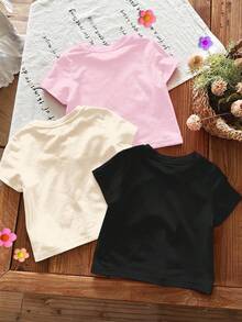 SHEIN LMoss Kids 3件套休闲度假热带花卉图案基础款圆领短袖T恤，包含芙蓉花、鸡蛋花、海星、珍珠贝壳海滩场景图案，适合年轻女孩，休闲简约，适合春夏穿着，颜色有黑色、米色和浅粉色。 - 彩色 - 查看 2