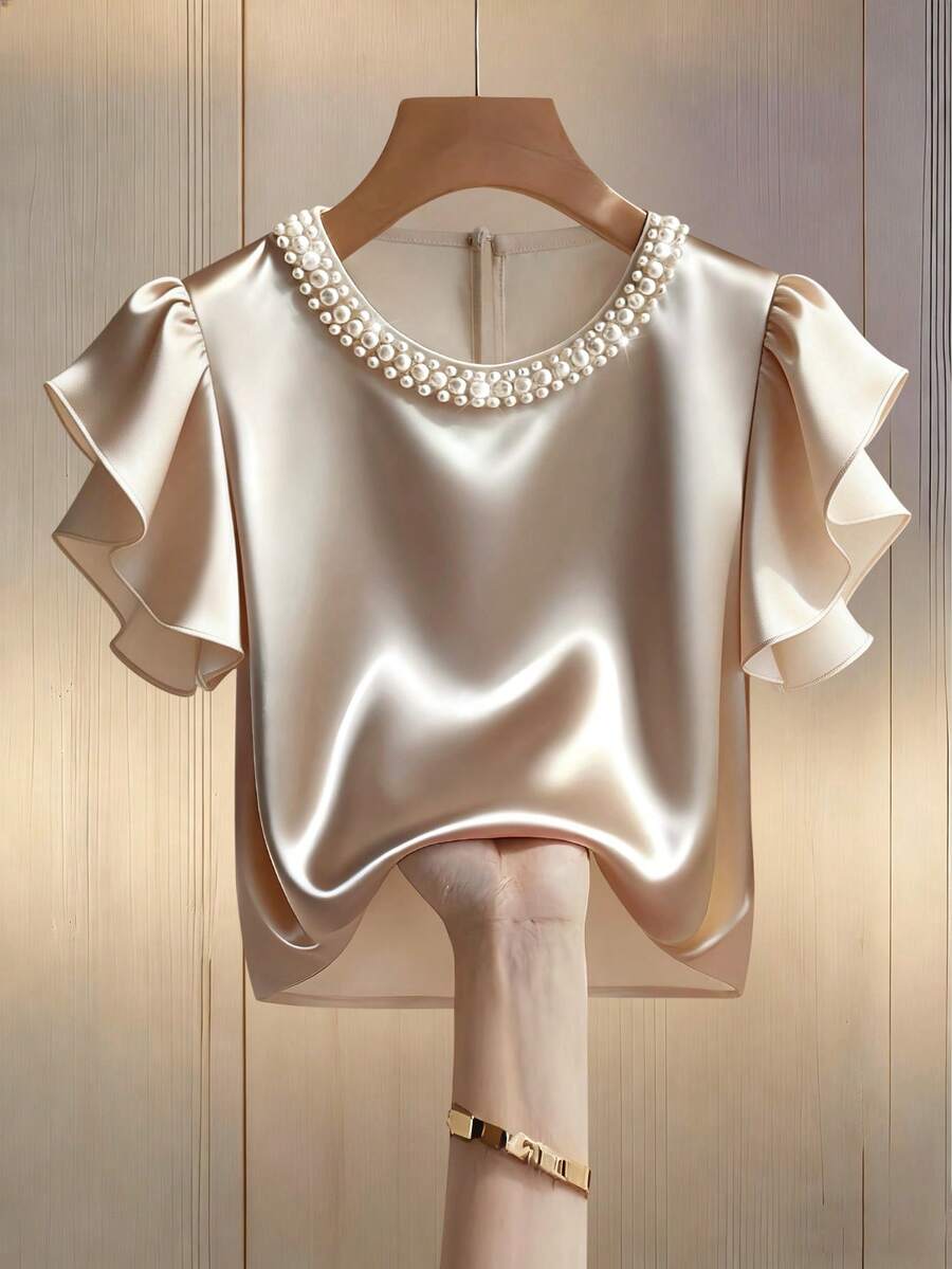 Ellegaria. Áo sơ mi satin acetate cổ tròn, tay bồng, đính ngọc trai, kiểu dáng thanh lịch, thích hợp mặc đi làm hoặc đi nghỉ mát. - Màu be - Xem 1