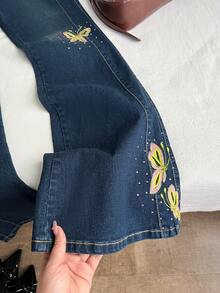 Elamini Women's Casual Everyday Flared Jeans With Pockets, Button, Bow Embroidery Design - Blue - View 4