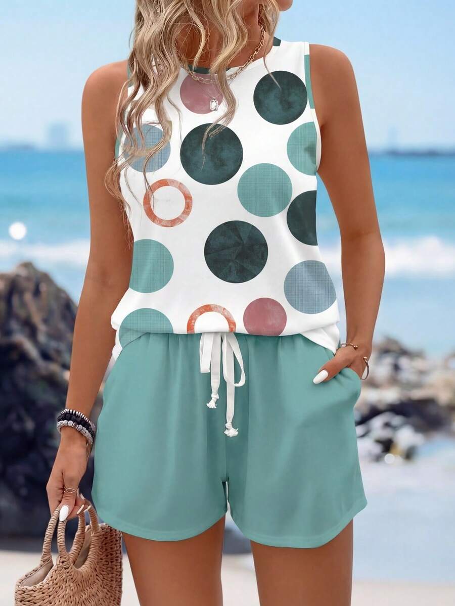 Sylviya Bộ đồ nữ gồm áo hai dây cổ tròn không tay nhiều màu sắc và quần short có túi dây rút, thích hợp mặc mùa hè. Bộ đồ hai mảnh mùa hè cho nữ, bộ đồ ngắn cho nữ, bộ đồ ngắn cho kỳ nghỉ. - Nhiều màu - Xem 1