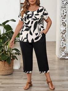 EMERY ROSE Bộ 2 món dành cho nữ cỡ lớn, áo sơ mi ngắn tay cổ tròn và quần lửng, cổ tròn tay ngắn có túi, bộ đồ phối hợp đơn giản và thời trang, phù hợp cho mùa hè, kỳ nghỉ, đi chơi, dự tiệc, lễ Phục sinh. - Đen và trắng - Xem 1