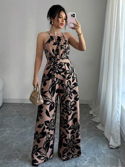 SHEIN Elenzya Mono de pierna ancha con estampado, sin mangas, con cintura envolvente, elegante para vacaciones y uso diario, talla grande para mujeres
