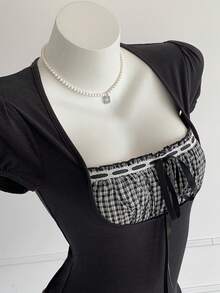 Comfortcana Áo kiểu nữ tay ngắn phối màu kẻ caro trơn, thời trang xuân/hè 2026, kiểu dáng thanh lịch, thích hợp đi nghỉ mát, đi chơi, phong cách Y2K những năm 2000. - Đen và trắng - Xem 7