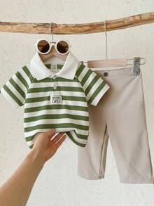 SHEIN Bộ đồ đôi 2 món dễ thương cho bé trai: áo polo tay ngắn kẻ sọc và quần cạp chun, thích hợp cho tiệc sinh nhật, tiệc tưng bừng, tiệc tối, biểu diễn, đám cưới, tiệc mừng em bé chào đời và lễ kỷ niệm sinh nhật lần thứ nhất, mùa xuân/hè. - Nhiều màu - Xem 3