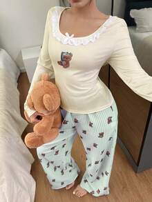 Bộ đồ ngủ nữ Dream Adore hình gấu dễ thương, trang trí ren, gồm áo ôm sát và quần rộng thoải mái. - màu xanh lá - Xem 3