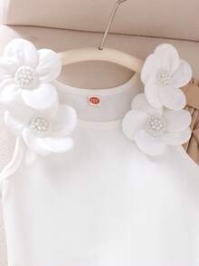 Genkimix Kids Bộ đồ 2 món cho bé gái tuổi teen gồm áo không tay dệt kim họa tiết hoa 5 cánh màu trắng và quần cùng màu, thời trang và phù hợp cho mùa hè. - trắng - Xem 5