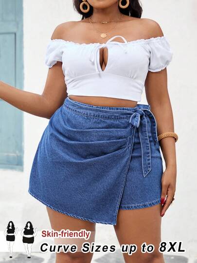 SHEIN CURVE+ Plus Size Women Asymmetric Hem Casual Denim Skort With Side Knot Summer Carnival Costume Commuting Vacation Graduation Chic Y2k Cute Streetwear Coquette Party Wedding Elegant Business Casual Woman Business Beach Graduation Easter Women's Day Denim Shorts Plus Size Women's Denim Ruffle Wrap Shorts With Tie Waist Skin-Friendly Summer Denim Skirt With Shorts Underneath