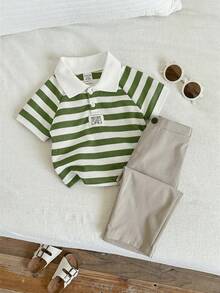 SHEIN Bộ đồ đôi 2 món dễ thương cho bé trai: áo polo tay ngắn kẻ sọc và quần cạp chun, thích hợp cho tiệc sinh nhật, tiệc tưng bừng, tiệc tối, biểu diễn, đám cưới, tiệc mừng em bé chào đời và lễ kỷ niệm sinh nhật lần thứ nhất, mùa xuân/hè. - Nhiều màu - Xem 7