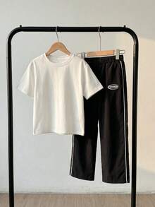 SHEIN Little Byeori 男童休闲运动裤，直筒版型，柔软舒适，带抽绳装饰，适合日常穿着、上学、户外活动、运动等多种场合，春、夏、秋、冬四季皆宜。 - 黑色 - 查看 3