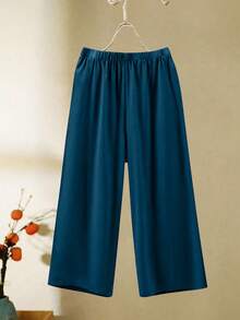 Bộ đồ nữ cỡ lớn gồm áo tay ngắn cổ tròn màu trơn và quần ống rộng, kiểu dáng thường ngày. - Màu xanh ngọc - Xem 4