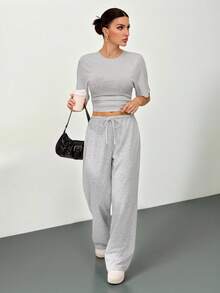 SHEIN Tall طقم تي شيرت وبنطلون كاجوال قطعتين للنساء، تي شيرت بياقة دائرية وأكمام قصيرة على شكل خفاش، لون أحادي - رمادي - مشاهدة 7
