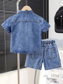 SHEIN Young Boy Fashionable Cozy Cotton Denim 2pic Set,  Medium Wash Blue With Button Front Fastenning Short Sleeves Shirt Top, A Pratical Flat Pockets , Street Cool Style Letters Embroidered Detail, Light Weight Cotton Fabric For Summer Daily , Spring Vacation Shorts For Boys, Boys Relax Denim Shorts, Preppy School Ootd Fashion Item, Casual Basic Shorts For Boys, Boys Dneim Shorts, Jean Shorts For Young Boys, Young Boys Shorts, Holiday Kids Wear, Easter Kids Wear, Mother's Day Kids Wear. Young Boys Burmuda Shorts.Versatile Casual Summer Fashion Item For Kids - Blue - View 2
