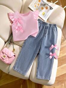 SHEIN Bộ đồ 2 món cho bé gái: Áo dệt kim màu trơn với điểm nhấn nơ 3D + Quần jean, trang phục thường ngày dễ thương cho mùa xuân/hè, phù hợp cho mặc hàng ngày và các hoạt động ngoài trời. - Hồng - Xem 1
