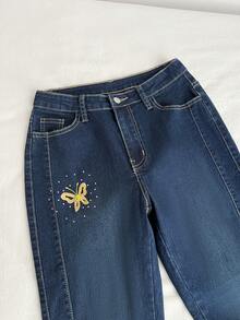 Elamini Women's Casual Everyday Flared Jeans With Pockets, Button, Bow Embroidery Design - Blue - View 3