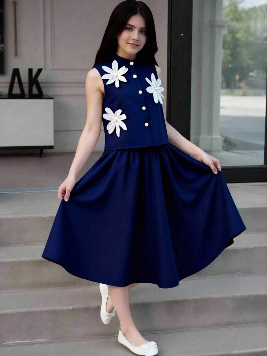 SHEIN ChillGRL 女童两件套：纯色 A 字裙搭配无袖高领开衫背心，饰有花瓣图案，适合春夏日常休闲穿着。 - 藏蓝色 - 查看 1