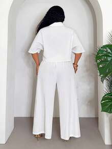Veslaya Bộ đồ mùa xuân/hè mới gồm áo croptop trắng dáng rộng và quần ống rộng, có cúc trang trí, chất liệu vải dệt, hơi xuyên thấu, thích hợp cho tắm nắng, nghỉ dưỡng khách sạn/du thuyền, đi làm, mặc thường ngày, dự tiệc, họp mặt gia đình, cỡ lớn. Bộ 2 món - trắng - Xem 3