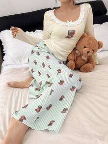 Bộ đồ ngủ nữ Dream Adore hình gấu dễ thương, trang trí ren, gồm áo ôm sát và quần rộng thoải mái. - màu xanh lá - Xem 6
