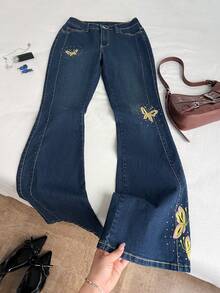 Elamini Women's Casual Everyday Flared Jeans With Pockets, Button, Bow Embroidery Design - Blue - View 1