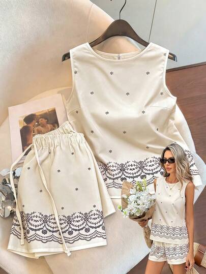 Franclia Women's Spring/Summer New Perris Floral Print Loose Tank Top + Elastic Waist Relaxed Fit Pants 2-Piece Casual Suit Set, Suitable For Vacation, Holiday, Afternoon Tea, Commute, Daily Wear Womens Summer Sets 2 Piece Short Sets Woman Casual Two Piece Set Women Summer 2 Pieces Sets Top And Shorts Set Womens Short Sets Summer Short Sets Women Womens Summer Outfit Set White Lace Tank Top White Romper For Women