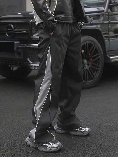 Manfinity Sport Corelite 男士条纹拼接长裤，适合运动、休闲和各种场合穿着。