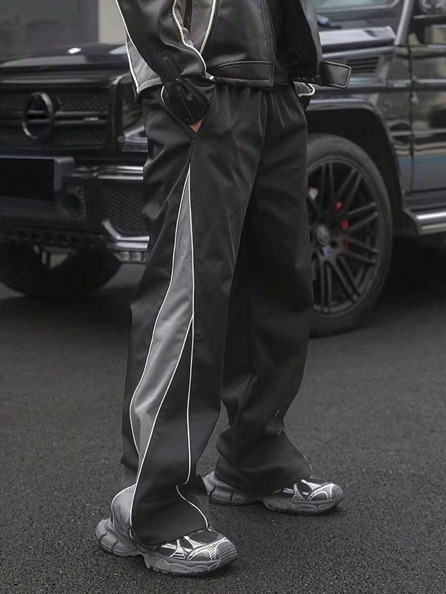 Manfinity Sport Corelite 男士条纹拼接长裤，适合运动、休闲和各种场合穿着。 - 黑色 - 查看 1