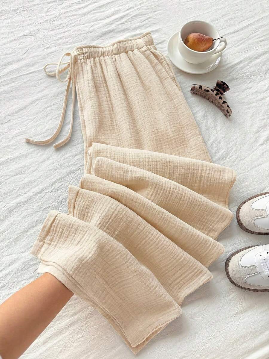 GalTyme Quần ống rộng dáng suông, màu trơn, chất liệu vải nhăn, có dây rút, thích hợp cho kỳ nghỉ hè, cỡ lớn. - Màu be - Xem 1