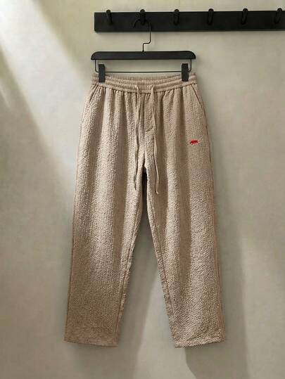 ESTAVOR Quần nam ống đứng dáng rộng, có dây rút ở eo và túi.