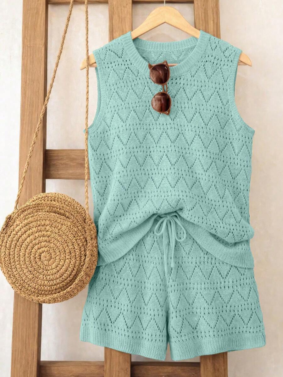 Franclia Conjunto de 2 piezas de suéter para mujer con diseño hueco, estilo coreano sexy, pantalones cortos huecos y chaleco de punto suelto de estilo europeo y americano para vacaciones en la playa, de primavera/verano 2026 - Azul menta - Ver 1