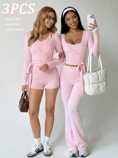 SHEIN Sovereign Charm 三件套女士春夏运动套装，包括：粉色马卡龙系带长袖V领运动上衣（后背交叉设计，带可拆卸胸垫）、性感运动文胸和常规腰围运动短裤。时尚百搭，适合日常休闲穿着、跑步、瑜伽、健身、网球、高尔夫、骑行等运动。