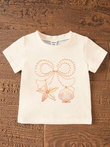 SHEIN 一套女婴珍珠蝴蝶结项链、印花可爱海洋生物贝壳蝴蝶结图案宽松圆领短袖T恤和修身骑行短裤套装，适合春夏、休闲、海滩、周末出行，可爱夏季女婴套装，韩版风格，夏季外出，女婴夏季服装，女婴贝壳套装，女婴沙滩套装 - 彩色 - 查看 6