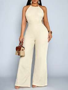 SOLERSUN Bộ jumpsuit dệt kim ống rộng màu trơn thanh lịch dành cho nữ cỡ lớn mùa xuân/hè, thích hợp mặc hàng ngày trong kỳ nghỉ ở Hawaii, kiểu dáng thoải mái, có chi tiết cắt eo, tua rua, hở lưng, cổ yếm, chất liệu dệt kim, mang đến vẻ đẹp sang trọng tinh tế cho kỳ nghỉ. - Màu be - Xem 4