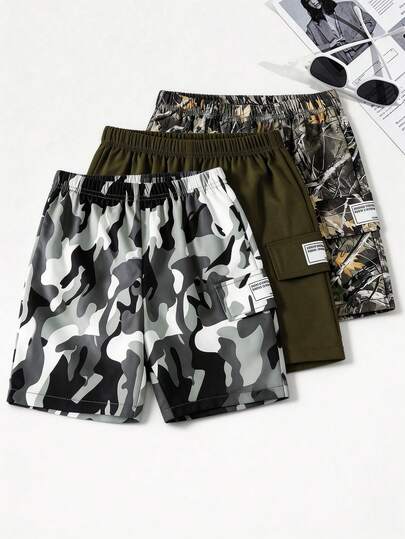 SHEIN 3件套男童休闲纯色及迷彩树叶印花宽松梭织短裤，舒适日常穿着，适合通勤、上学、休闲、旅行、运动、春夏穿着。
