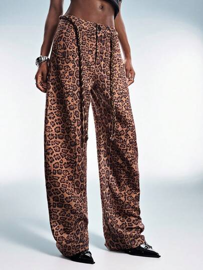 GENKIRA Pantalones de estilo callejero retro y sexy para mujer con estampado de leopardo, cintura alta, pierna ancha, decoración de cuerda trenzada en la cintura, bolsillos cargo, cierre con cremallera y piernas drapeadas