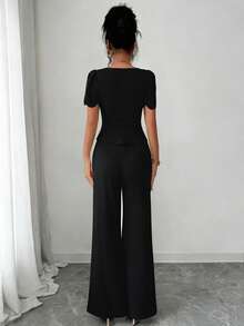 SHEIN Elenzya Bộ đồ công sở thanh lịch thời trang dành cho nữ gồm 2 món: Áo kiểu cổ vuông tay ngắn cài cúc vạt lệch và quần ống đứng cạp cao có chun co giãn. - màu đen - Xem 2