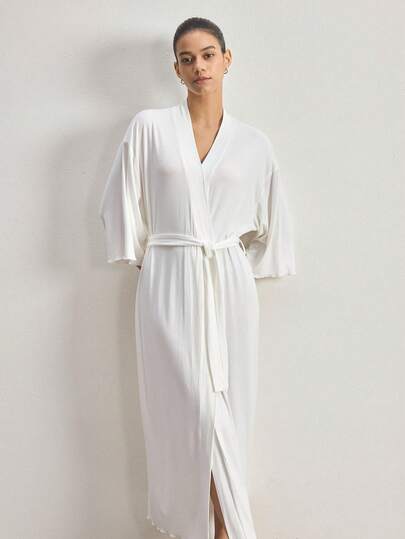 Ocili Áo choàng ngủ nữ tay lửng 3/4, màu trơn, chất liệu mềm mại, thoải mái, có gân, dáng rộng.