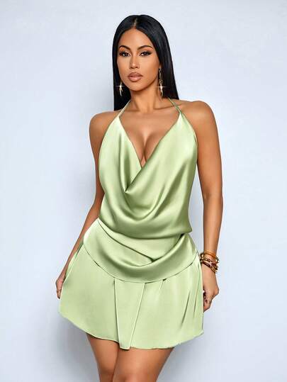 SOLERSUN Sexy, Elegant, Casual, Suitable For Commuting, Parties, Dates, And Beach Vacations. A Halter-Neck, Backless, Sexy Jumpsuit/Dress In A Soft Lilac/Purple Color, Perfect For Spring/Summer And Beach Holidays. Old Money Style.